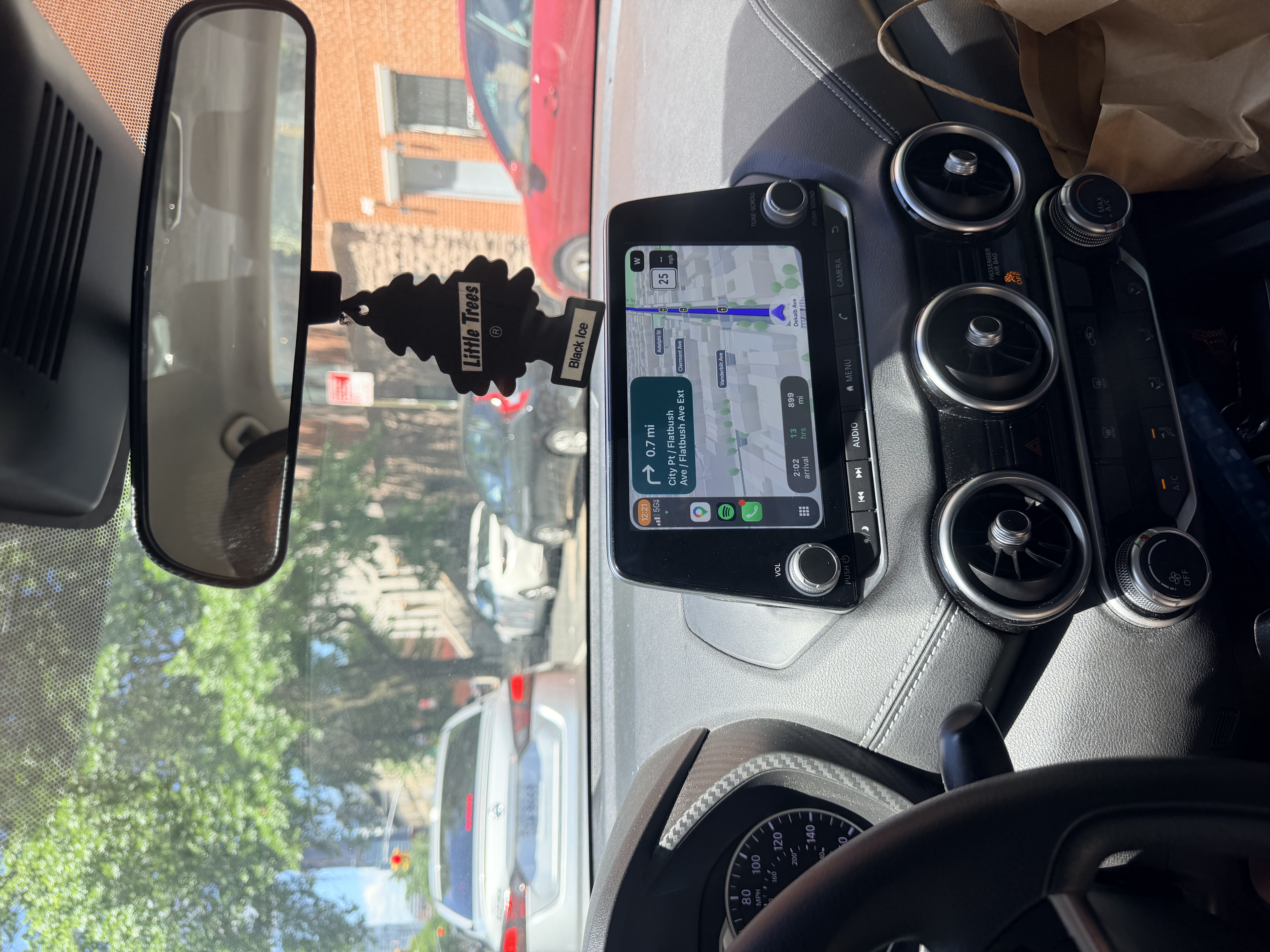 A phone showing turn-by-turn navigation during the fourteen-hour drive from Nashville to Brooklyn.