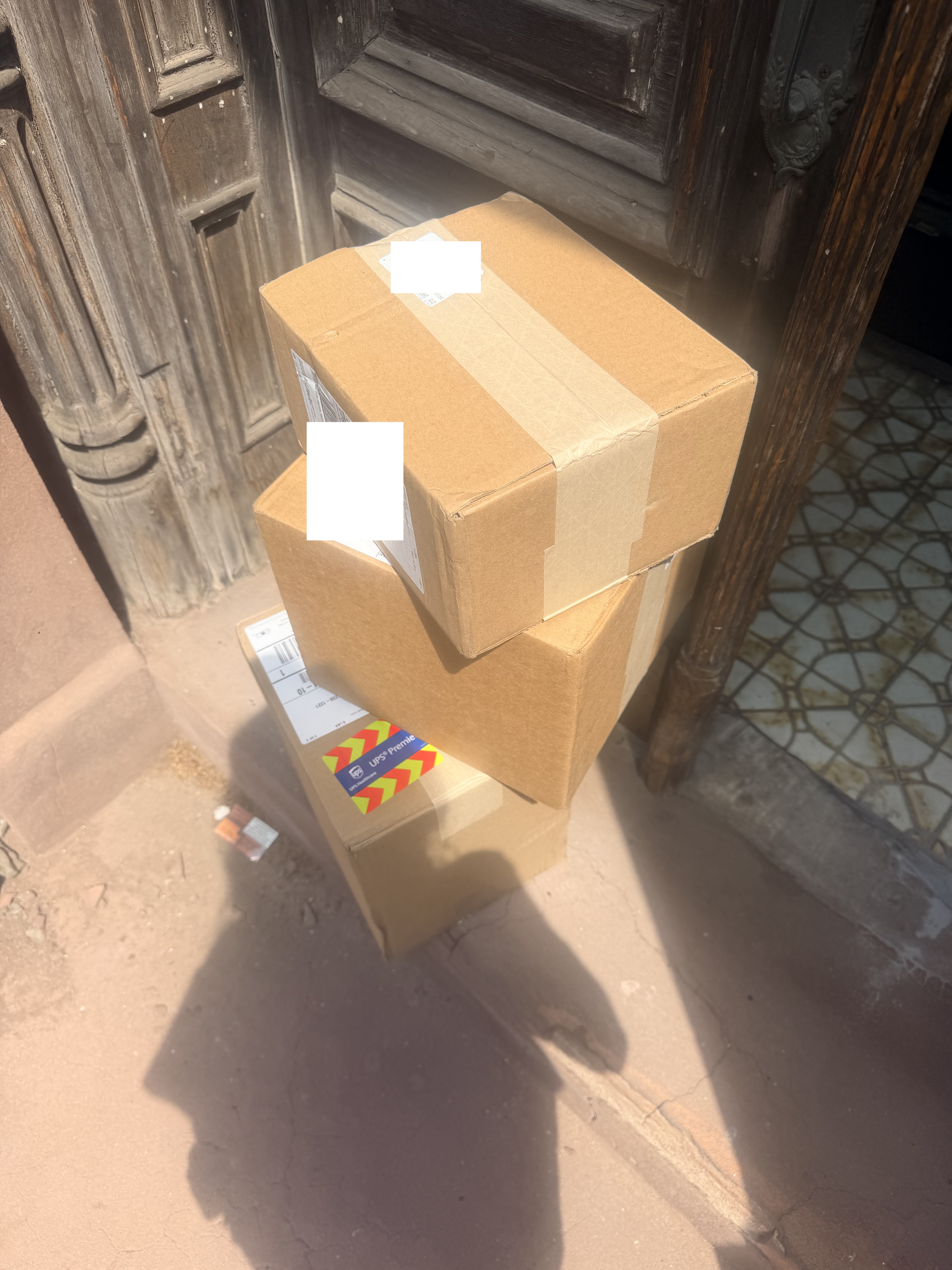 Fertility medication boxes on apartment stoop in New York City